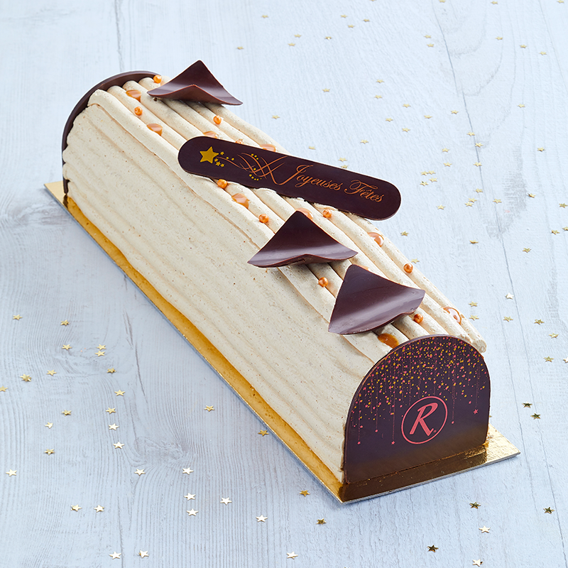 Bûche pâtissière praliné noisette - collection Noël - pâtisserie La Romainville Bûche pâtissière praliné noisette - collection Noël - pâtisserie La Romainville