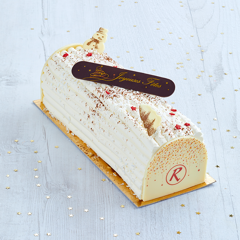 Bûche pâtissière noix de coco - collection Noël - pâtisserie La Romainville Bûche pâtissière noix de coco - collection Noël - pâtisserie La Romainville